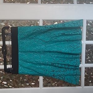 Teal green lace fit and flare skirt